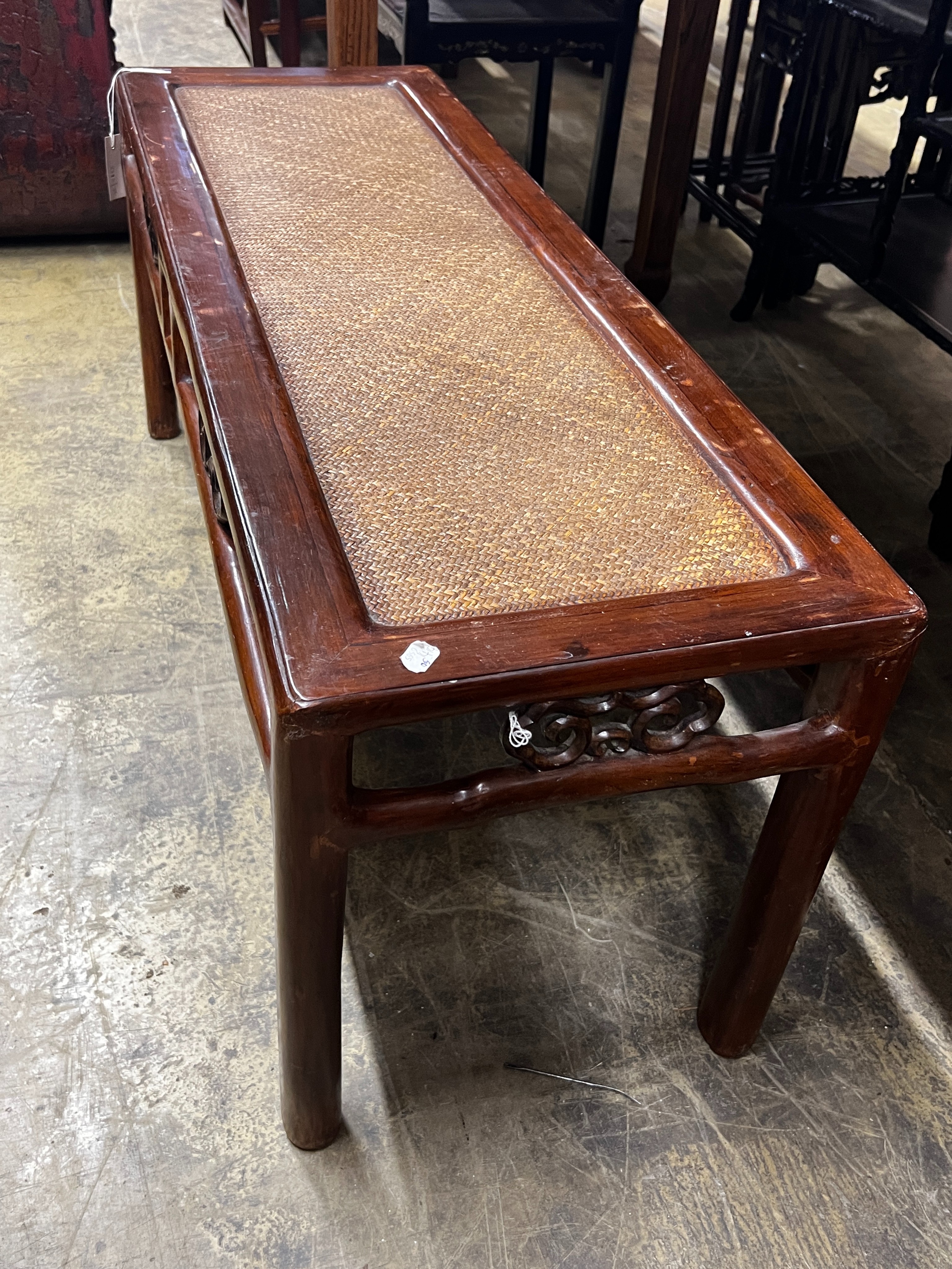 A Chinese caned hardwood rectangular low table, length 110cm, depth 38cm, height 48cm